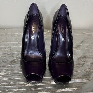 Aldo brand eggplant purple color. Gently used.